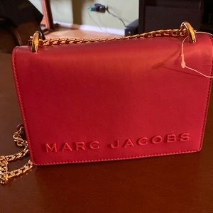 Hot pink leather Marc Jacobs crossbody bag. Gold/leather chain strap. Never used